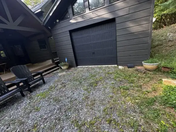 Garage exterior after junk removal — clean gravel, Dawsonville GA