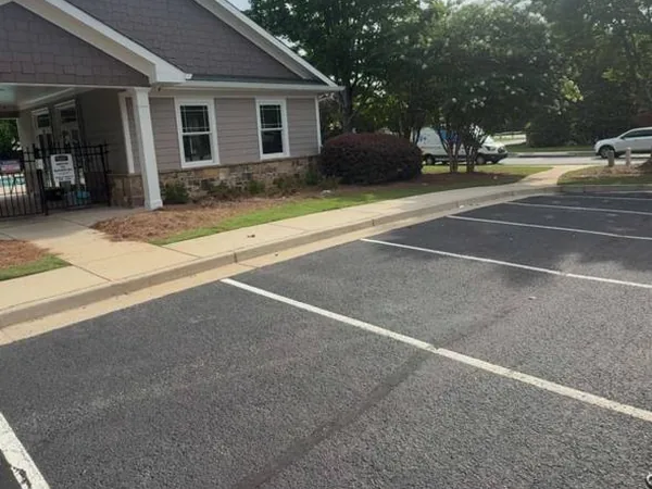 Commercial property entrance clear after a cardboard and debris haul, North Georgia